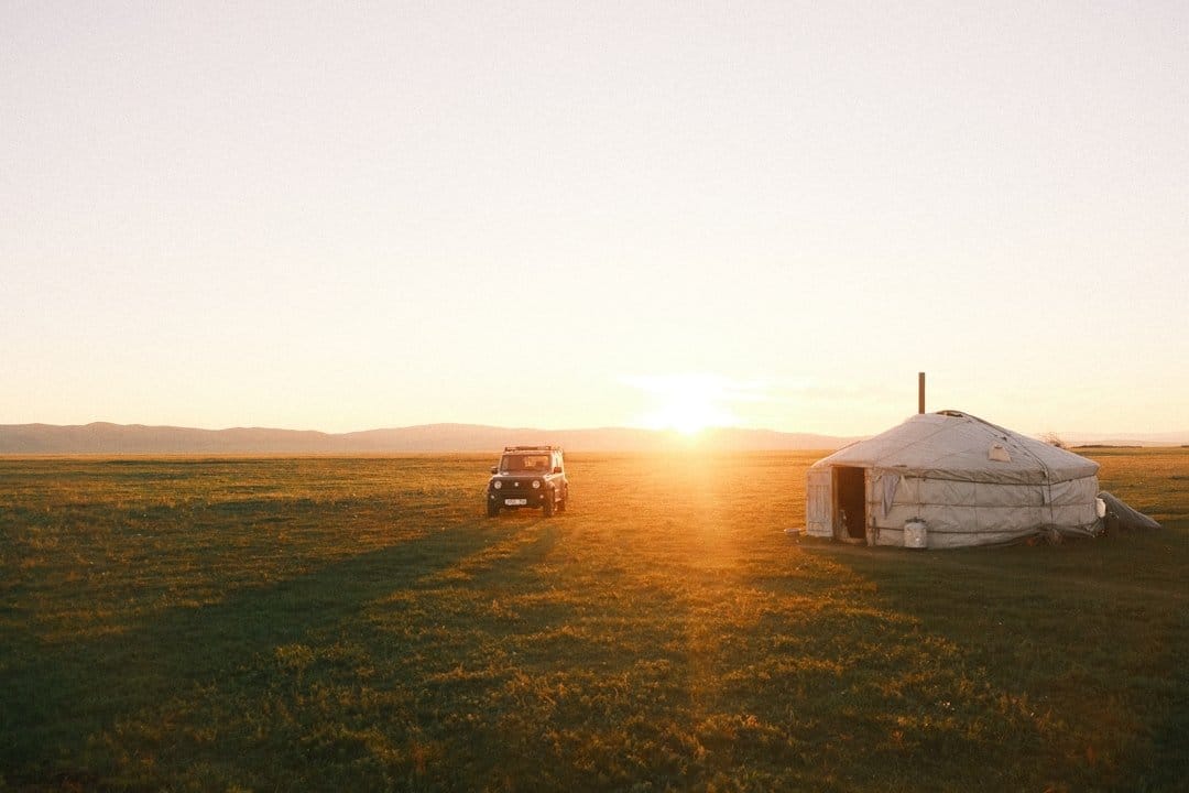 Mongolia steppe landscape with ger at sunset for tourism statistics 2026