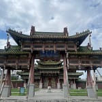 Ornate carved main gate of Bogd Khan Palace museum Ulaanbaatar — Naadam Festival Tour