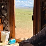 View through ger window across the Mongolian steppe - nomadic home interior