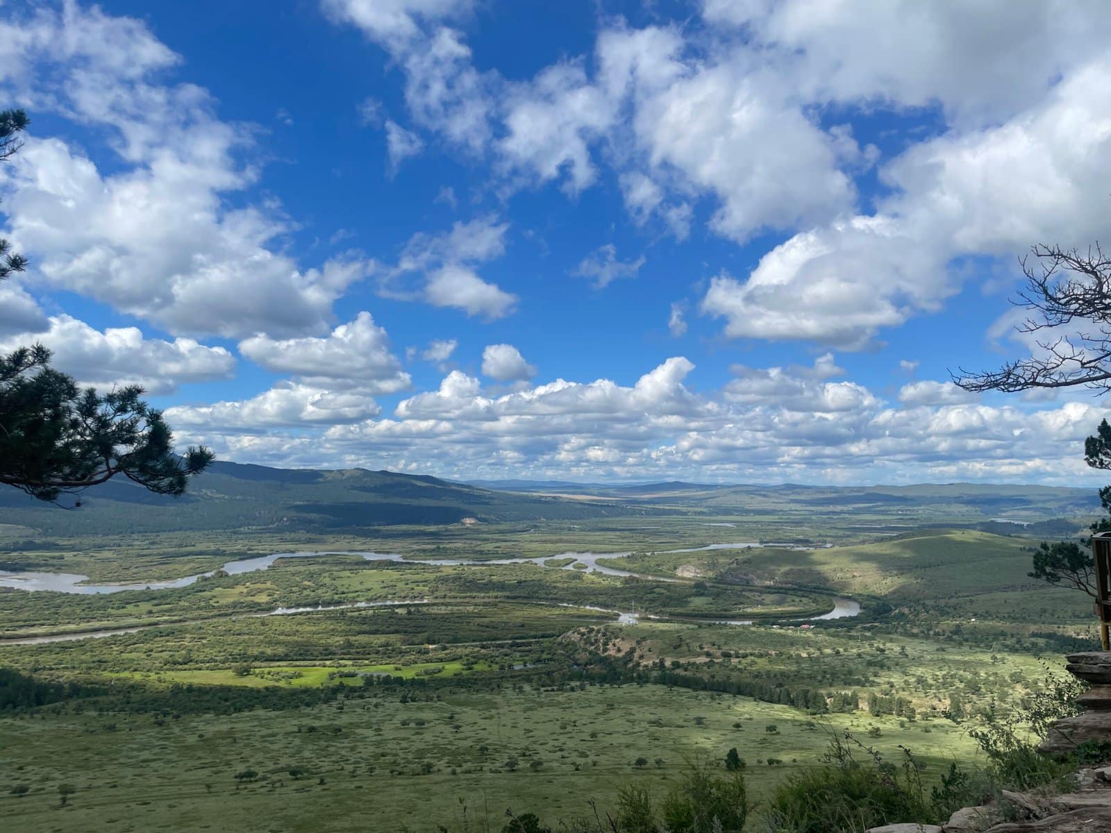 Orkhon Valley river winding through golden steppe viewed from hilltop — Mongolia Horseback Tour